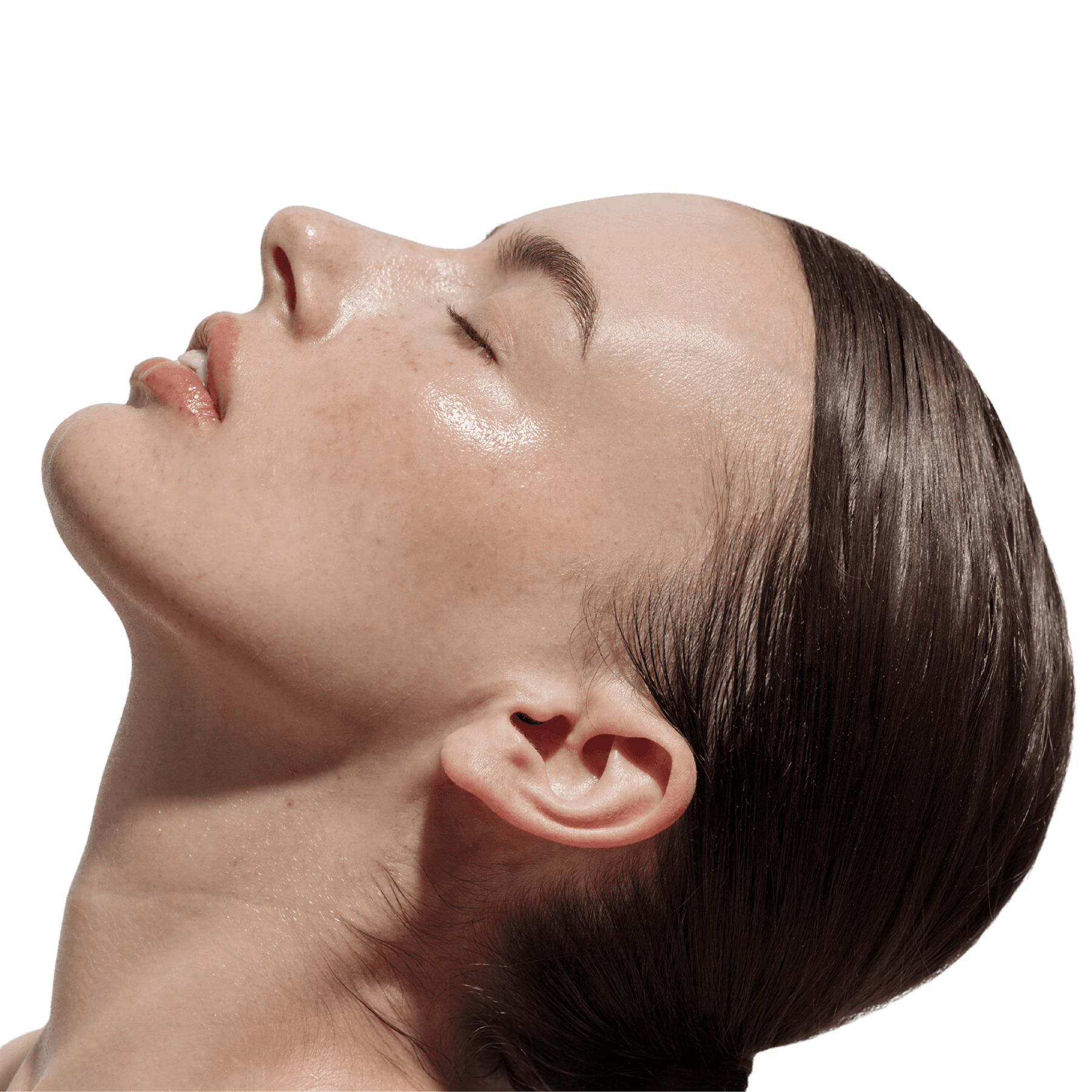 Woman in profile with her head tilted back and eyes closed, showing glowing, dewy skin