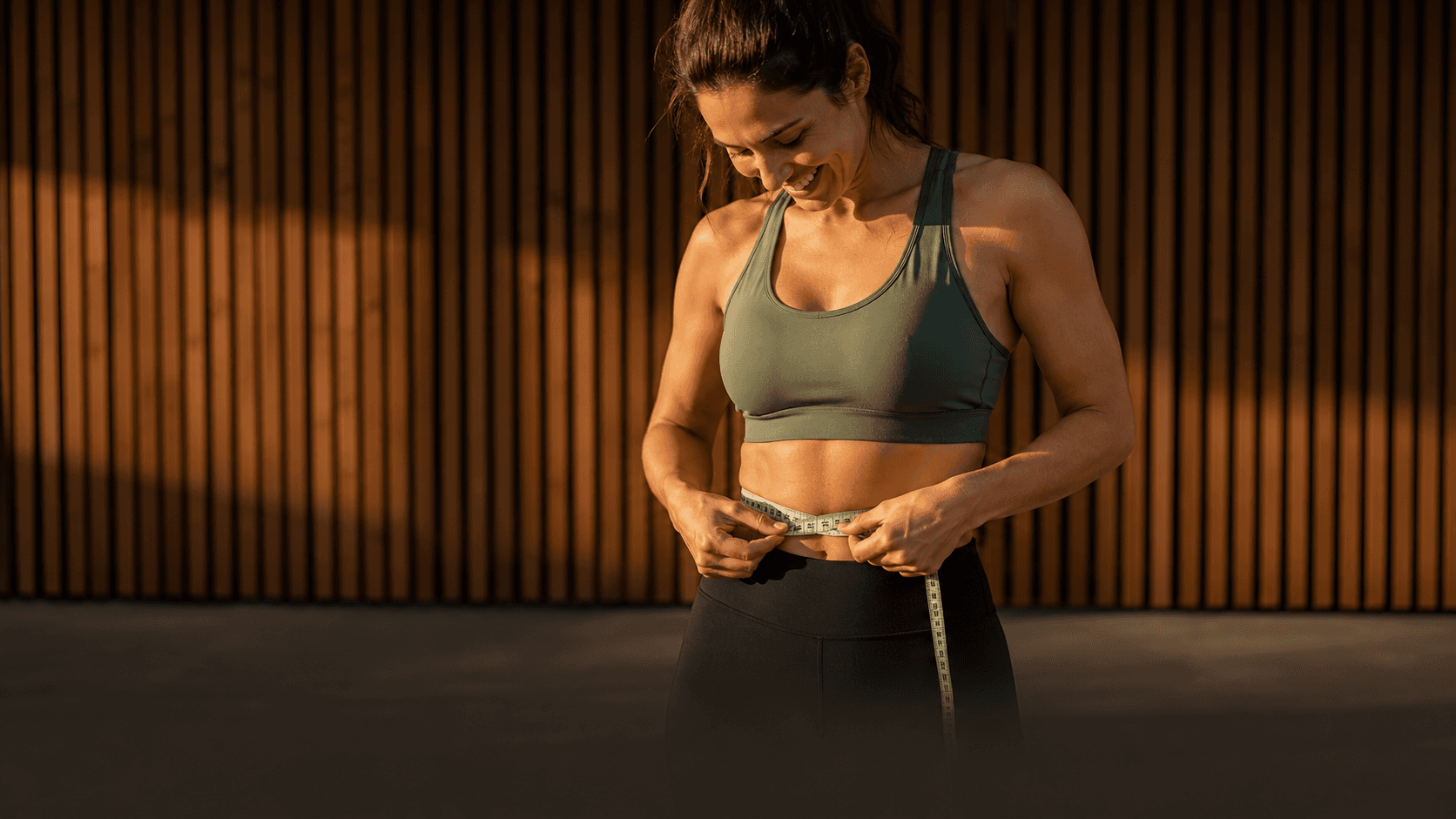 A woman reviewing wellness and body-composition progress